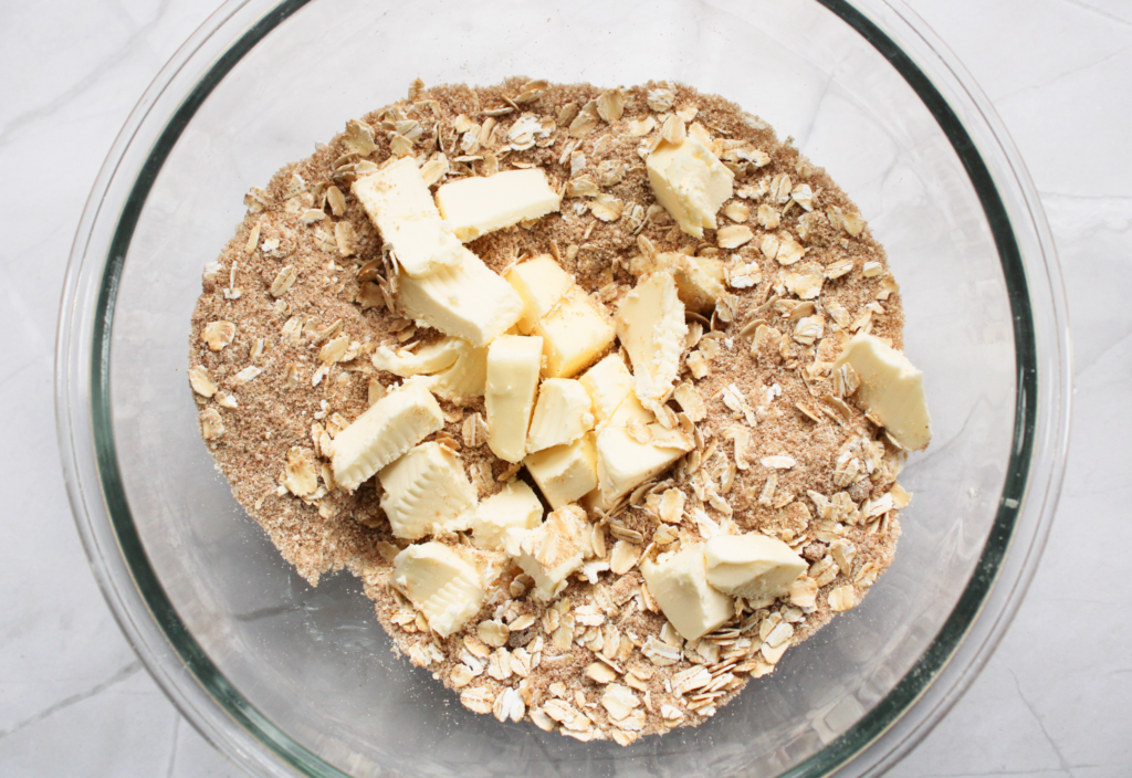 butter on top of brown sugar and oats for gluten-free apple crisp 